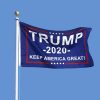 Trump 2020 Keep America Great Flag. Flying on a flagpole with a blue sky background